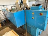 a blue machine that is inside of a building