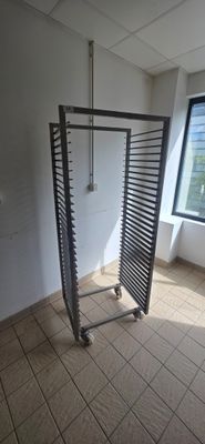 a room with a window and a rack in it
