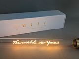 a light that is sitting on a table next to a box