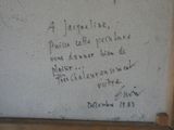 a picture of a piece of art with writing on it