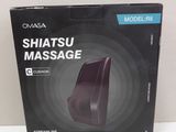 a close up of a box of massage equipment on a table