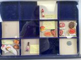 a picture of a display case with a variety of items in it