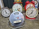 many different types of clocks on the ground