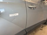 a car that has a sticker on the side of it
