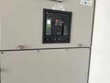 a control panel in the middle of a room