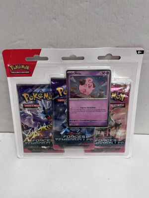 two pokemon cards in a clear plastic case on a white surface
