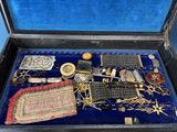 an open suitcase with a lot of items inside of it