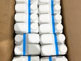 boxes of white and blue containers are stacked on top of each other