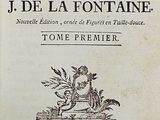an old book with a black and white image of a man on a horse