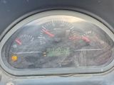 a close up of a speedometer in a car