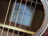 an image of a close up of a guitar with a label on it