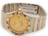 an image of a gold and silver wrist watch with roman numerals