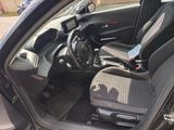 a picture of the inside of a car with the door open