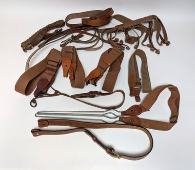 a lot of leather items that are on the table