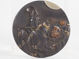 a plate with a picture of a man and a woman on it