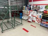 a large metal rack in the middle of a store