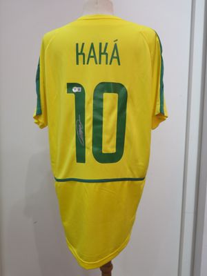 a yellow soccer jersey with the number 10 on it