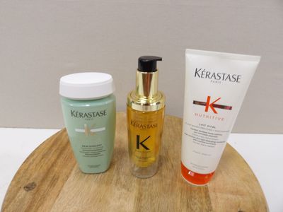 three different types of skin care products sitting on a wooden tray