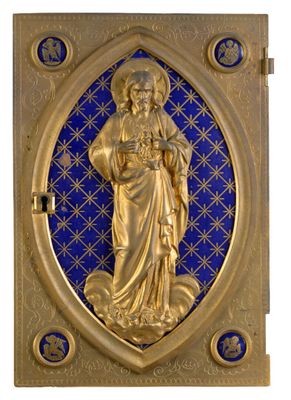 une image représentant une plaque dorée et bleue sur laquelle figure une statue de Jésus