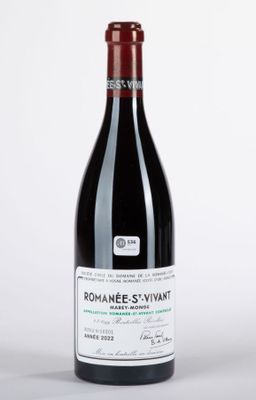 une photo d'une bouteille de vin sur fond blanc