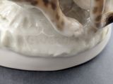 a close up of a cake with icing on it