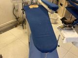 a blue table with a blue cover in a room