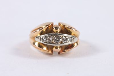 an image of a gold and diamond ring on a white background