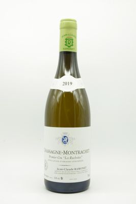 a bottle of wine that is sitting on a table