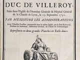 un vieux livre sur lequel figure l'image d'une femme assise sur une chaise