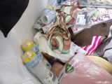 a pile of baby items in the back of a car