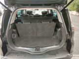 a trunk of a car with the back seats folded down