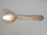 a spoon that is sitting on a table