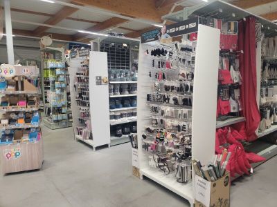 many items on the shelves in the store for sale