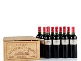 six bottles of red wine in a wooden box with a wooden box