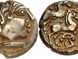 a silver coin with a horse on the front and a horse on the back