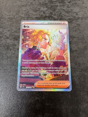 a close up of a pokemon card on a table