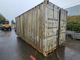 a large container sitting on the side of the road