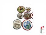 a lot of plates that are sitting on a table
