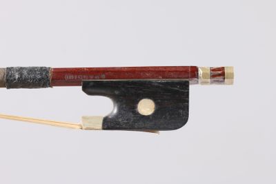 a violin bow with a bow rest attached to it