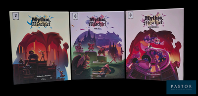 trois livres posés sur une table