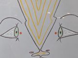 a drawing of a kite with two eyes on it