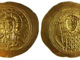 deux pièces d'or à l'effigie d'un homme et d'une femme