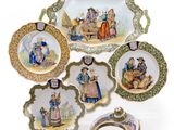 several plates with different designs and designs on them on a white surface