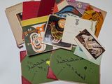 a pile of old postcards with writing on them