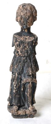 a statue of a woman that is standing on a white surface