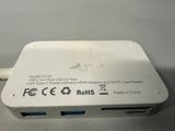 a close up of a white device on a table