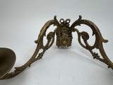 pair of antique brass wall sconces with ornate design