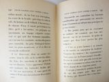 an open book with a picture of a cat on it