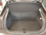 a trunk of a car with the back seat folded down
