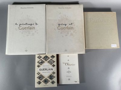 three books sitting on top of a table next to each other